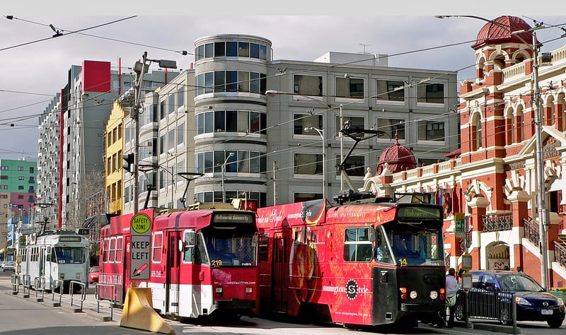 Red and white trams