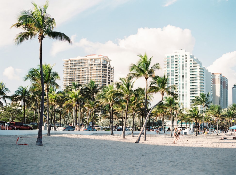 White, sandy beaches, turquoise waters and palm trees in South Beach Miami